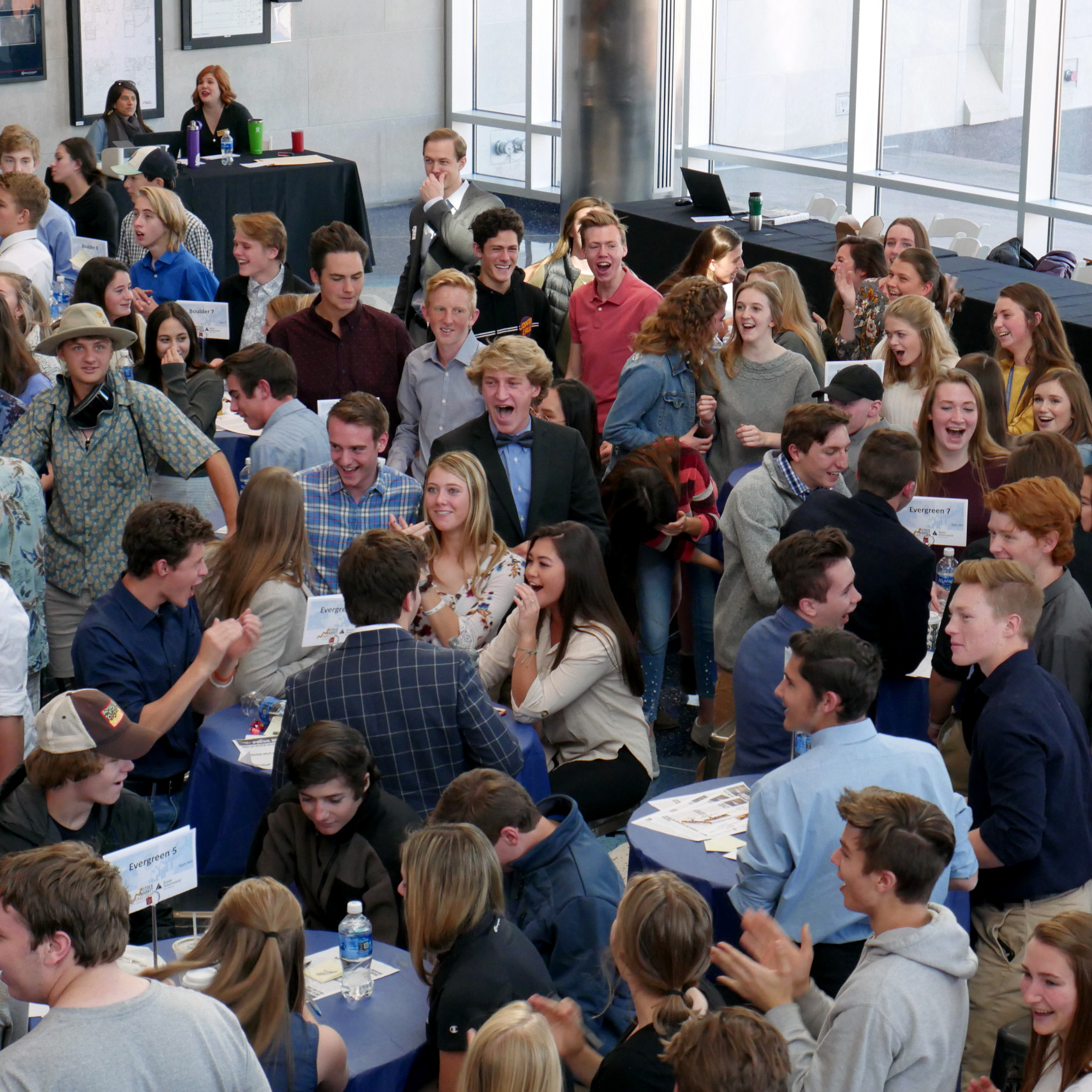 Crowd of students cheering at Junior Achievement Stock Market Challenge, presented by Wells Fargo